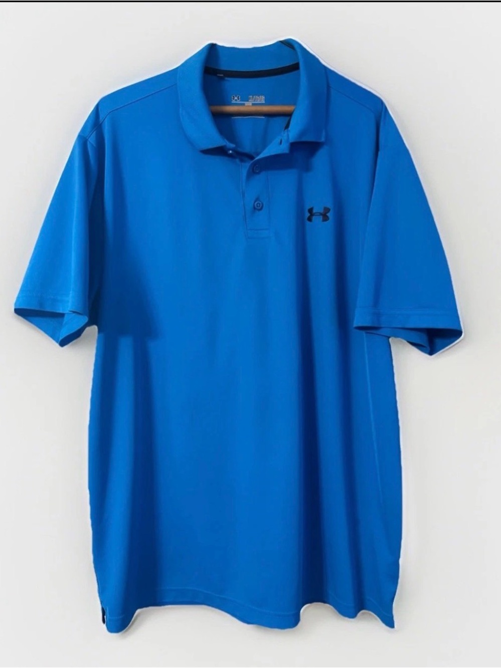 Under Armour Heat gear loose fit 4 way stretch polo shirt